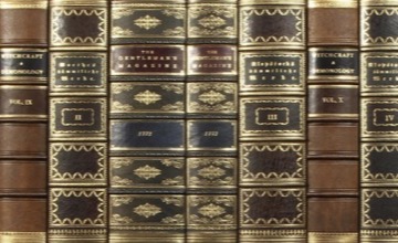 Leather book spines on panel