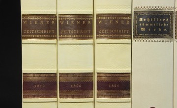 Leather book spines on panel